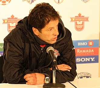 Preki at a press conference as the club's head coach; he coached the club from November 2009 to September 2010.