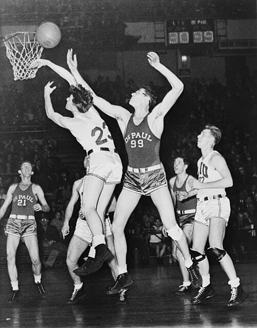 Hall of Famer George Mikan (#99) led the Lakers franchise to their first five NBA championships. He is described by the NBA's official website as the "first superstar" in league history.[14]