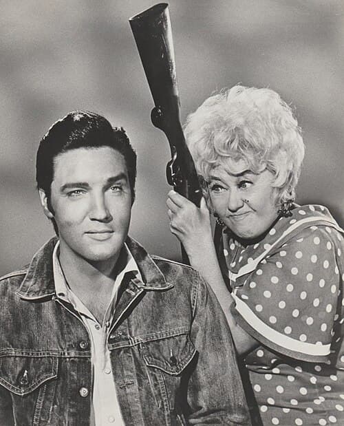 Presley (left) and Joan Blondell in October 1967, featured on a publicity portrait for Stay Away, Joe. After years of working for the film industry, Presley became unhappy with the quality of his roles.