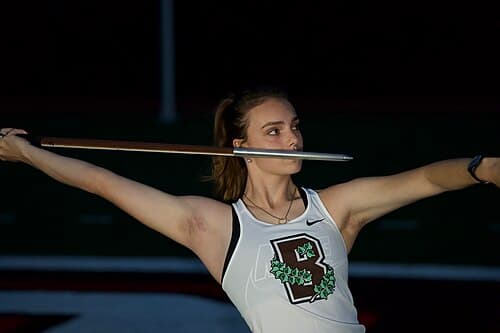 A Brown Bears women's track and field team member