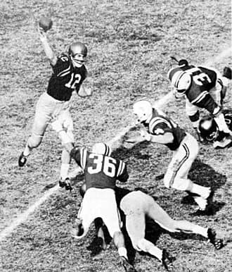 QB Roger Staubach (#12) won the Heisman Trophy in 1963. His number was retired by the Midshipmen