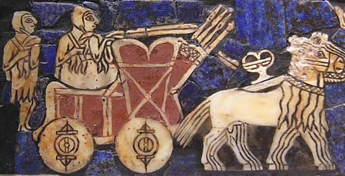 A depiction of an onager-drawn cart on the Sumerian "War" panel of the Standard of Ur (c. 2500 BCE)