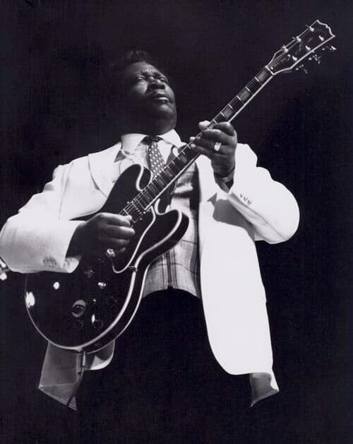 King playing his favorite guitar, Lucille, in the 1980s