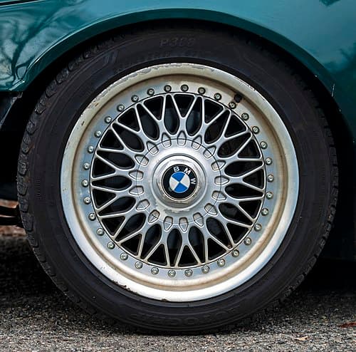 A wheel with car tire made by BMW company