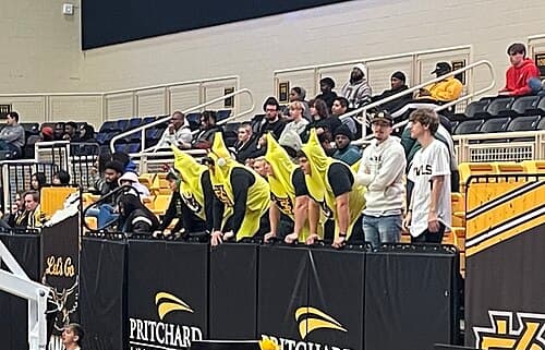 The KSU Banana Boys, who are the leaders of the Owl's student section