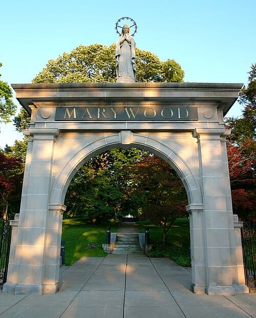 The Memorial Arch, built in 1902, marks the entrance to the original Motherhouse, which was the location of St. Mary's Seminary.