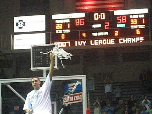 Penn senior Ibby Jaaber holds the net, which he cut from the rim, after Penn defeated Yale 86–58 on March 2, 2007, at The Palestra (which win clinched the 2006–07 Ivy League championship and Penn's 25th Ivy crown).