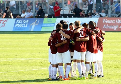 Republic huddle before second half of a friendly against Atlas FC
