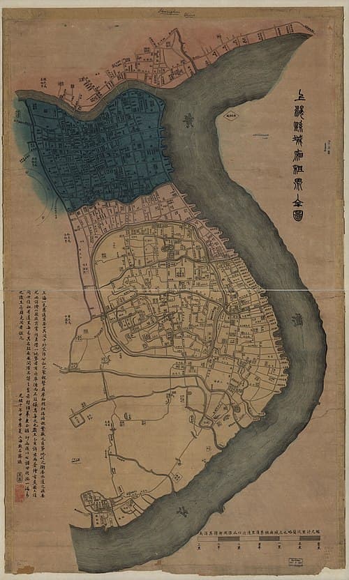 A map of Shanghai in 1884; Chinese area are in yellow, French in red/pink, British in blue, American in orange.