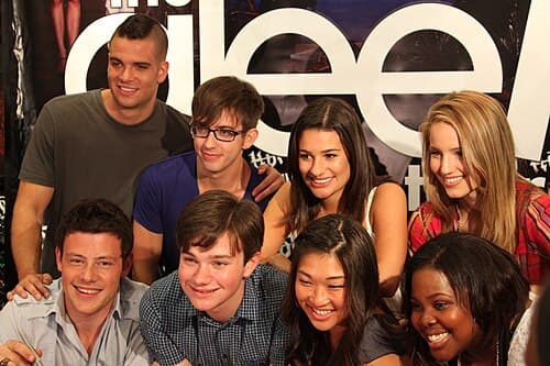 The cast of Glee covered Houston's songs on the episode, "Dance with Somebody", over two months after her death.