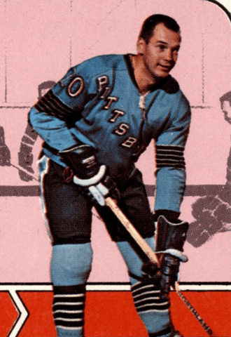 Ab McDonald (pictured in the original blue uniforms) was the first captain of the Penguins in the first season of the franchise in 1967; he played 74 games before he was traded the following season