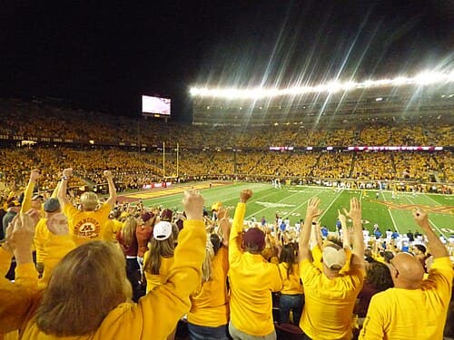 Gophers fans celebrating a touchdown in 2025 against Buffalo.