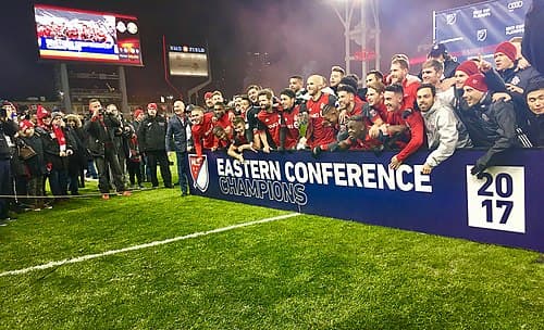 Members of Toronto FC taking a group photograph in BMO Field after being crowned as the Eastern Conference playoff champions in 2017