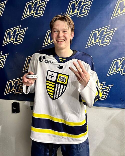 Merrimack player Parker Lalonde holding his first collegiate goal