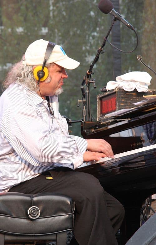 Rich Dworsky playing piano on a live broadcast in 2015