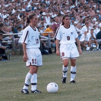 Kristine Lilly (13) and Mia Hamm (9)