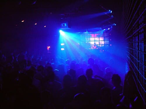 Strobing lights flash at a rave dance event in Vienna, 2005