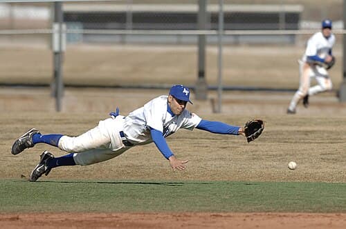 KJ Randhawa dives for a hard-hit ground ball