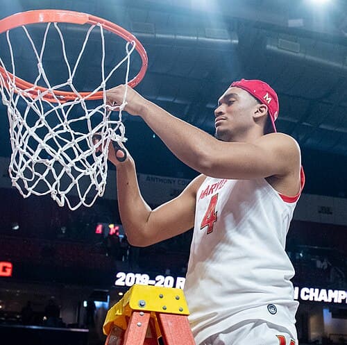 Ricky Lindo cutting down the net for Maryland, March 2020
