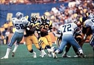 Dickerson (29) rushing through the Cowboys' defense in the 1985 NFC Divisional Playoff game.